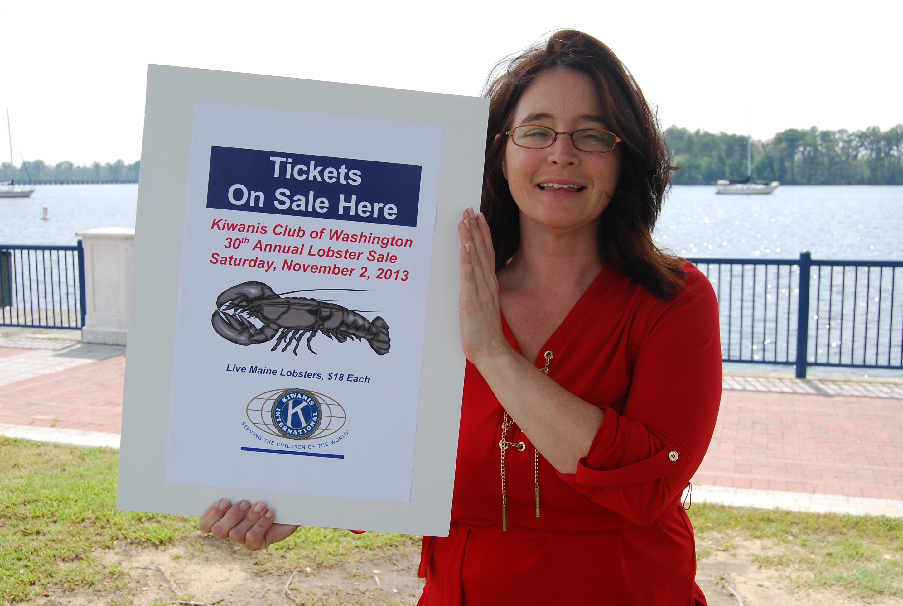 Cheryl
                          Scott with 2013 Lobster Sign